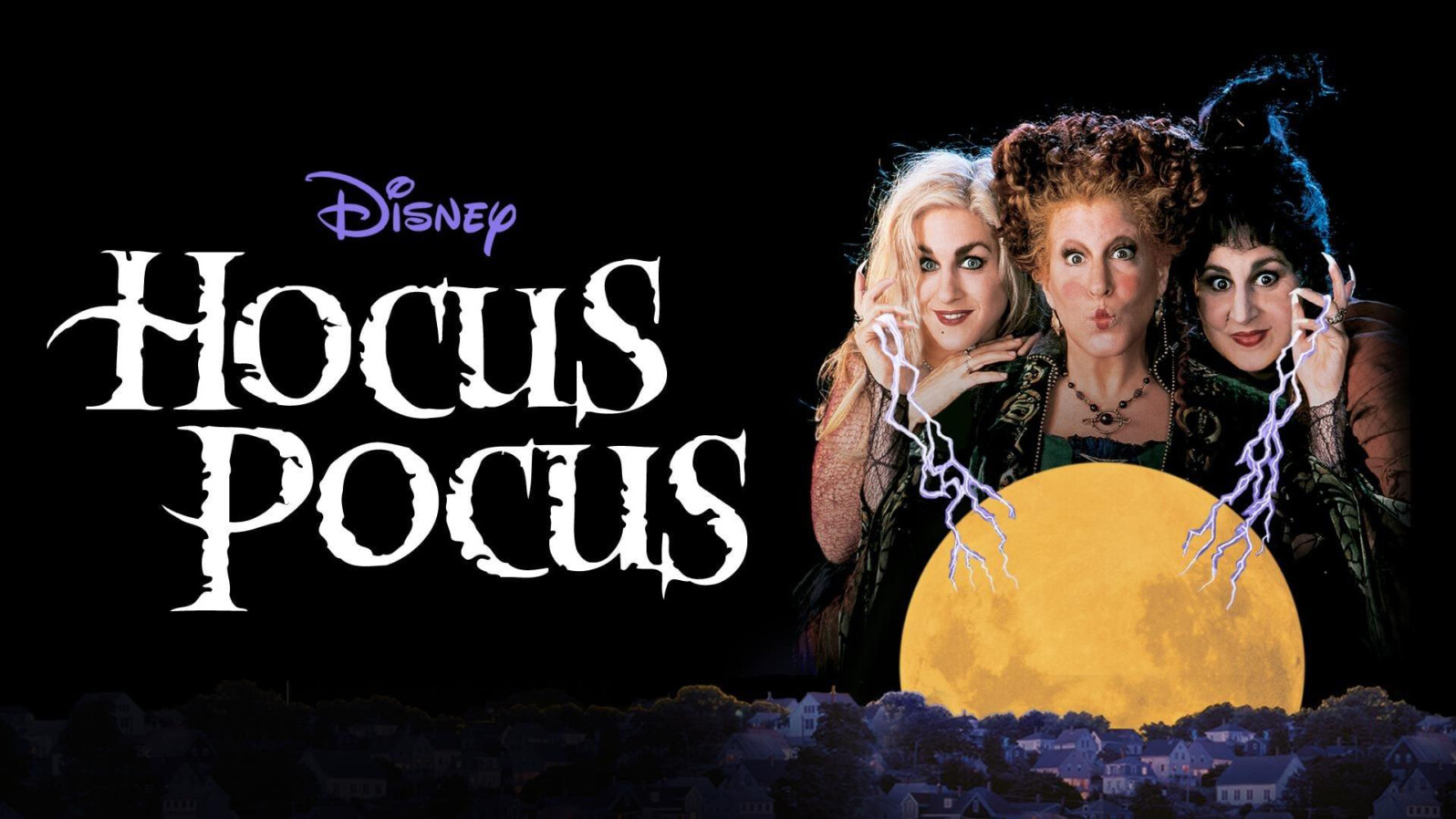 Three witches draw power from a full moon over a small town. Text reads, 