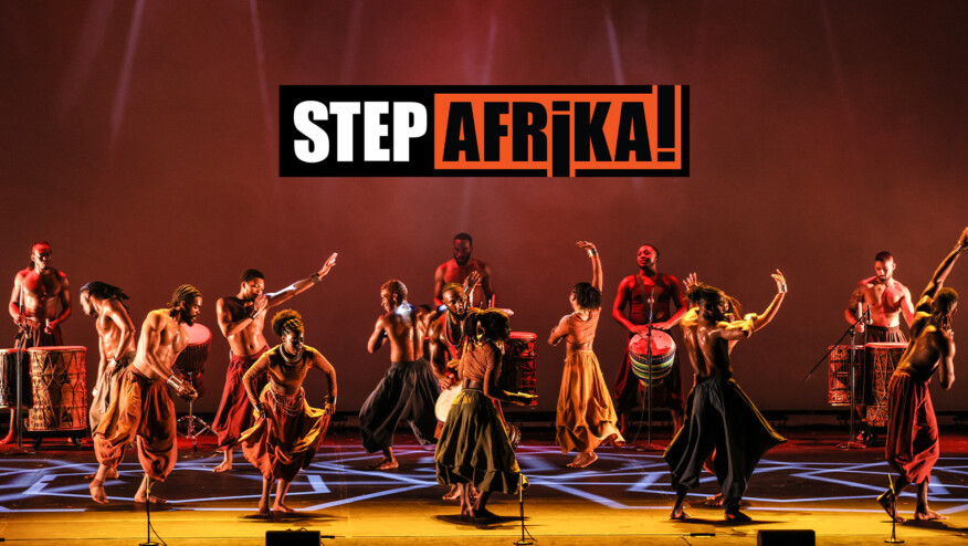 Dancers dance and drum on stage. Text reads, Step Afrika!