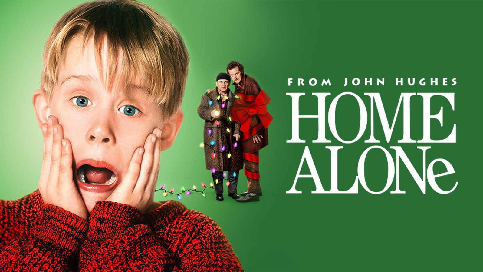 A boy with his hands on his face in surprise as burglars tied up in Christmas lights look on menacingly. Text reads, 