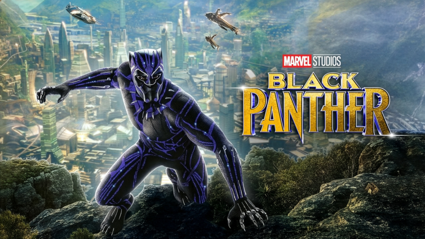 A man in a superhero suit poses on a group of rocks with a futuristic city in the background. Text reads, 