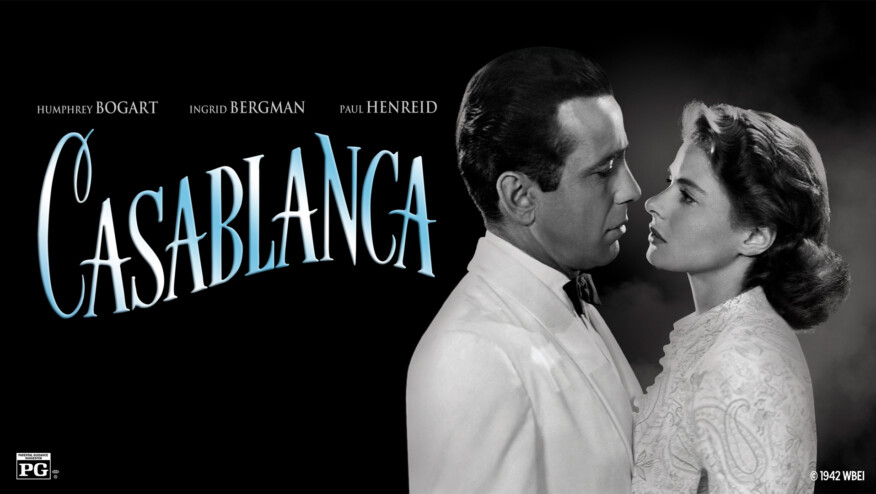 A man and a woman look longingly at each other. Text reads, 