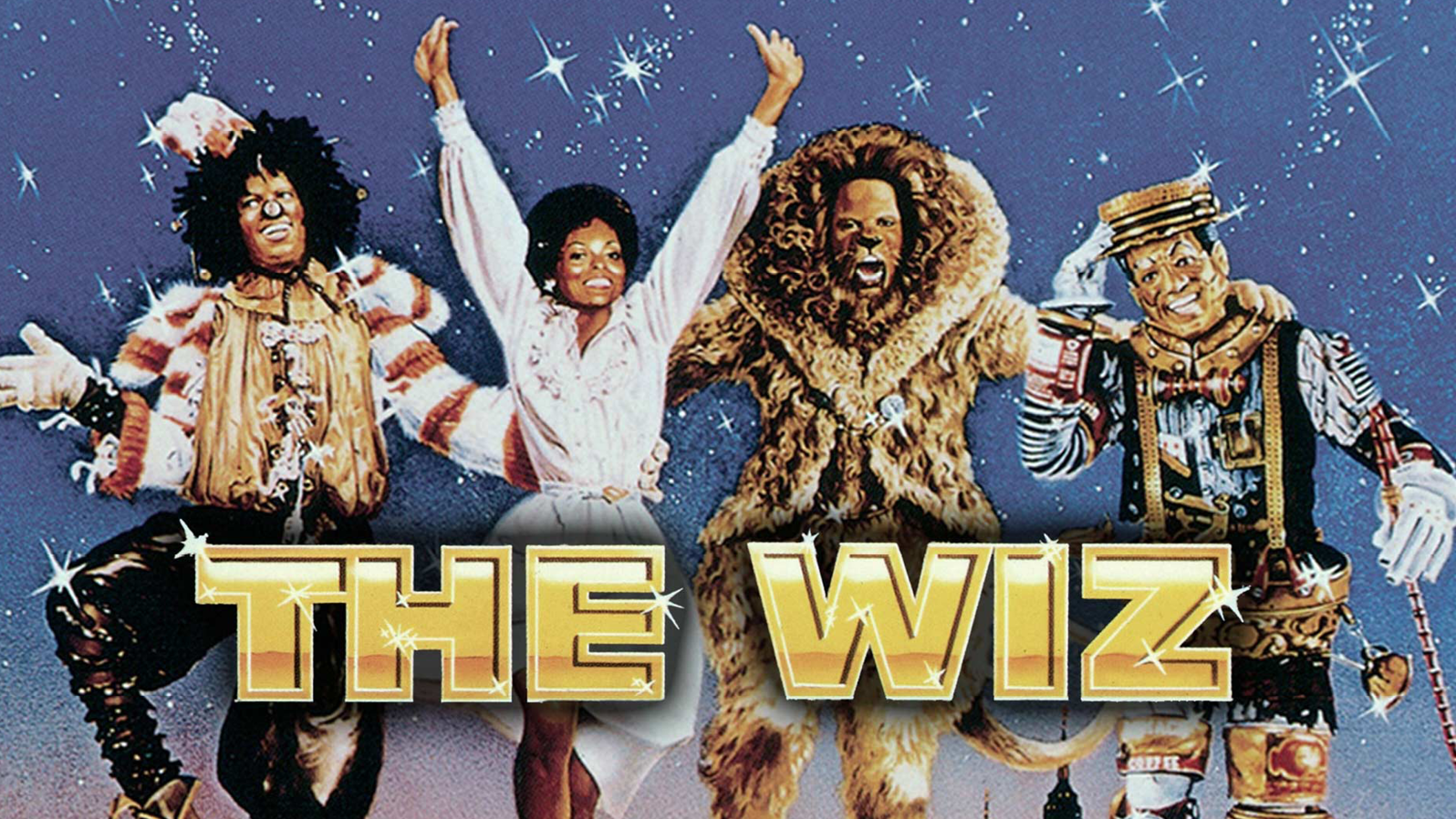 A scarecrow, a woman, a lion, and a tin man jump in glee. Text reads, 