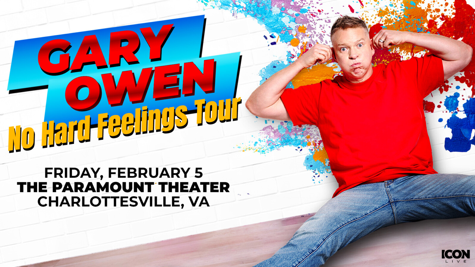 A man makes a funny face. Behind him is a wall of paint splatter and the words, "Gary Owen / No Hard Feelings Tour / Friday, February 5 / The Paramount Theater / Charlottesville, VA."